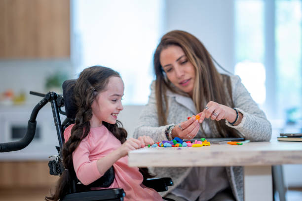 istock Cerebral Palsy Patient Working During Therapy 1410743030