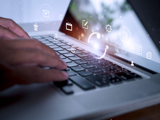 istock Hands man useing laptop computer with E-commerce technology icons on virtual screen. Business global, social media marketing concept. 1410744057