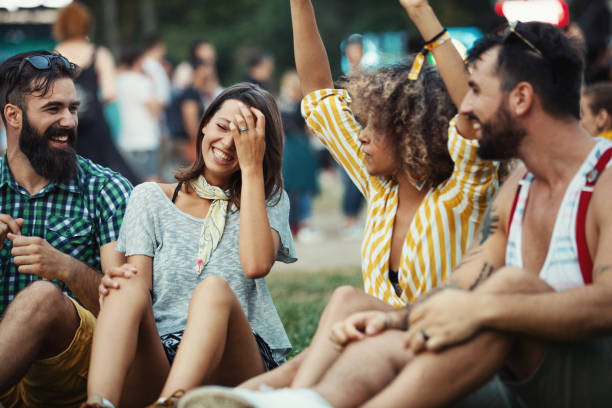 istock Group of friends chilling before a concert. 1410745176