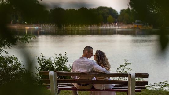 A young couple in love at lake