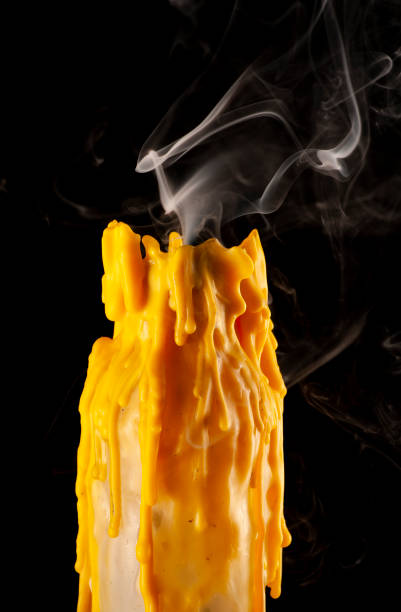 istock Candle melting creating abstract shapes and patterns with smoke also creating unique shapes 1410750896