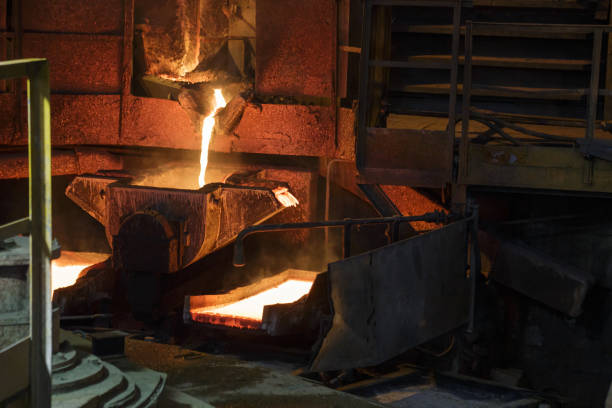 istock Process of pouring liquid hot copper into molds. 1410751858