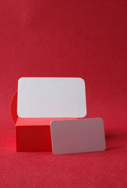 istock blank business card on pedestal on vivid red background studio 1410752508