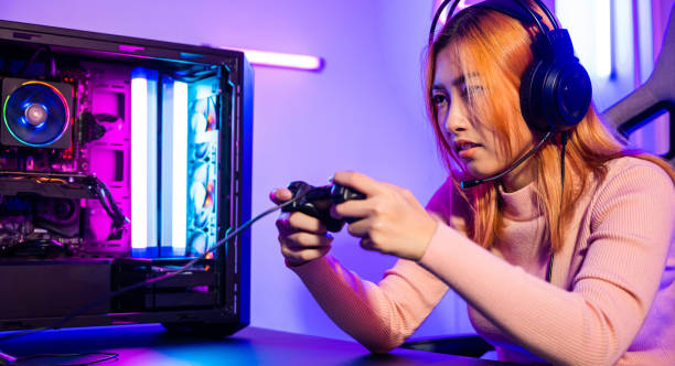 istock Gamer using joystick controller for virtual tournament plays online video game with computer 1410753243