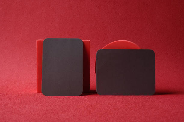 istock black business card on pedestal on vivid red background studio 1410753879