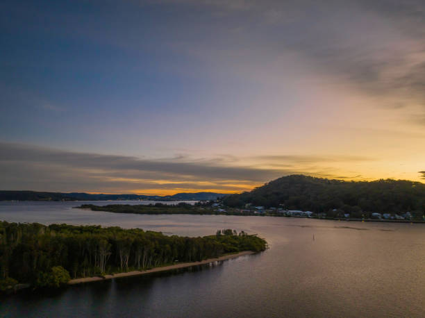 istock High cloud sunrise at the waterfront 1410755158