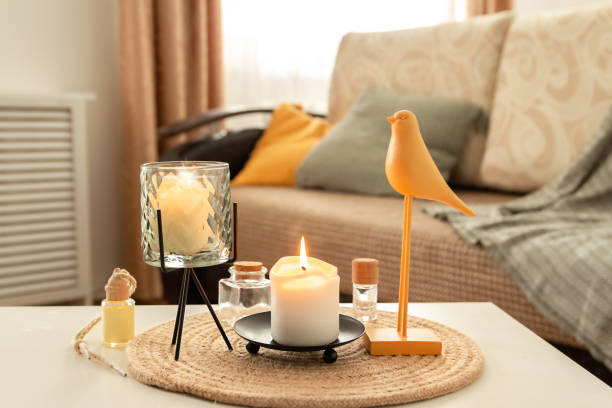 istock burning scented candles and essential oils on table in living room. Aromatherapy, home fragrance. Concept of home relaxation and anti stress. 1410757280