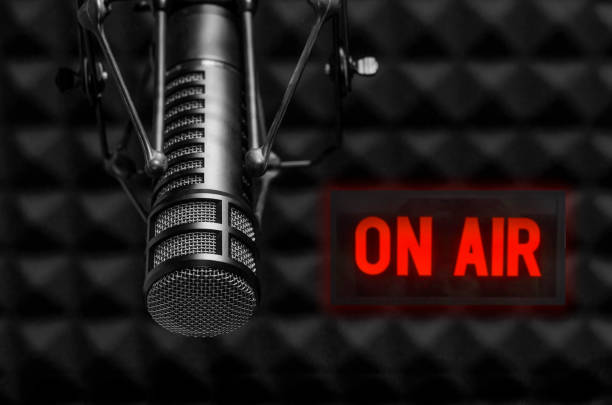 istock Professional microphone and on air sign 1410758670