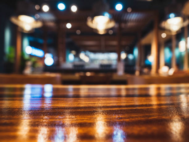 istock Table top counter Bar Night club Blur background 1410759039