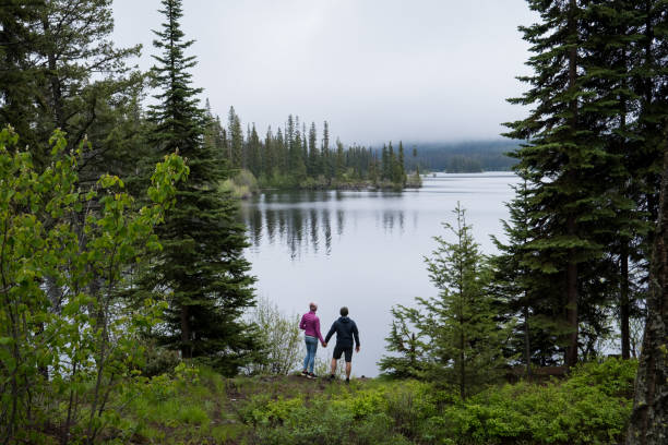 istock Couple enjoying a hiking vacation together 1410759208