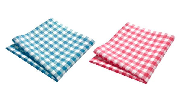 Red and blue checkered tablecloth top view isolated on white, food decor design element.Folded kitchen towel.Picnic cloth.