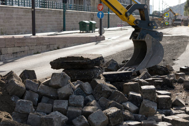istock Excavator on urban street 1410762181
