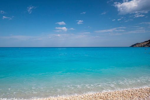 Tropical sea and blue sky with sun.