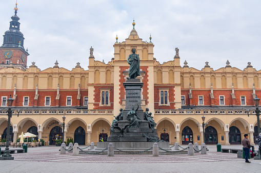 Krakow, Poland - 13 March, 2022: Cloth Hall, Sukiennice and Townhouse tower on Main square in Krakow. Travel