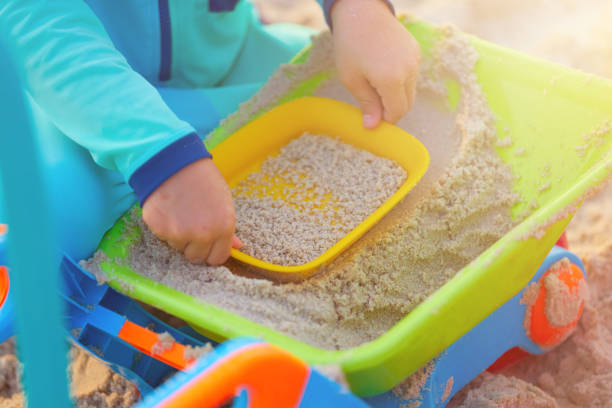 istock child play sand toy at beach close up 1410765295