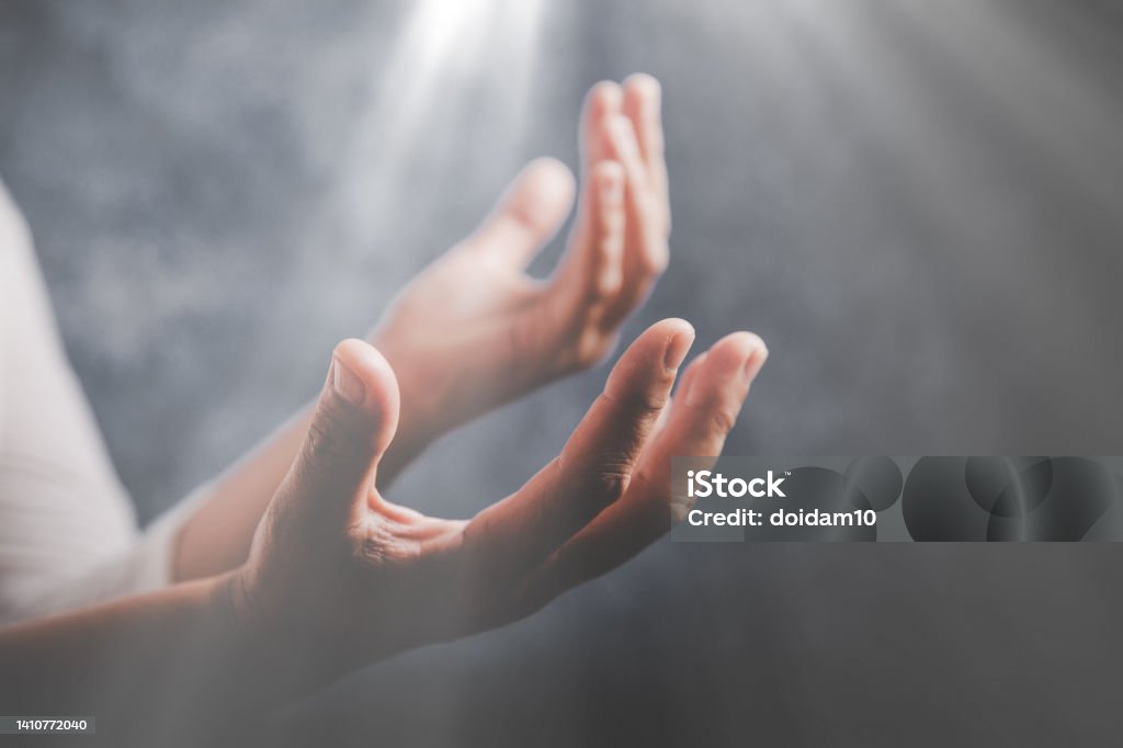 Woman Pray for god blessing to wishing have a better life Christian life crisis prayer to god. Woman Pray for god blessing to wishing have a better life. woman hands praying to god with the bible. begging for forgiveness and believe in goodness. Applauding Stock Photo