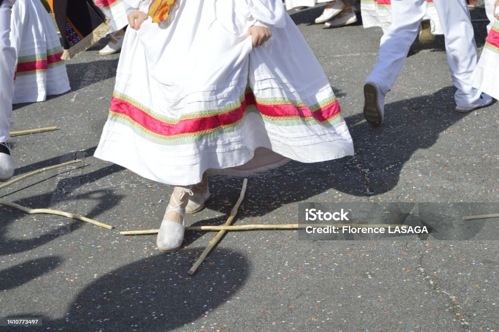 Traditional Basque dance during a carnival in the Basque Country A dancer in traditional costume dances the Basque dance of sticks Arts Culture and Entertainment Stock Photo