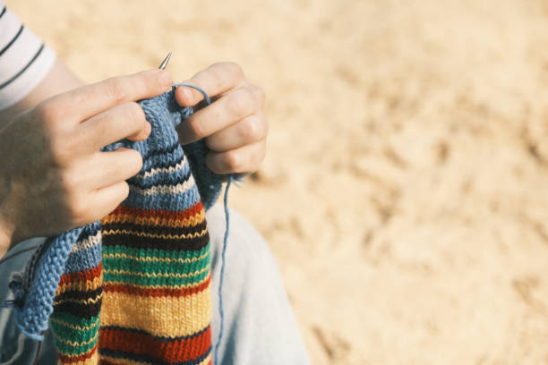 istock Everywhere knitting woman 1410779658