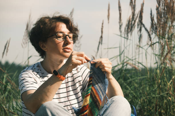 istock Everywhere knitting woman 1410779822