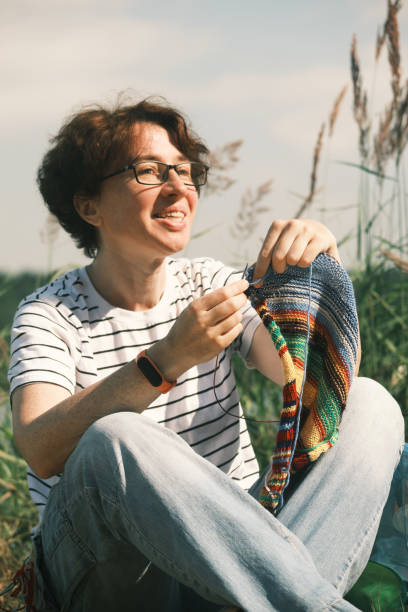 istock Everywhere knitting woman 1410779874