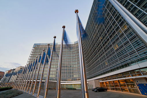 Brussels, Belgium, 4 April 2019 - European Union EU flags in front of the Berlaymont building, headquarters of the European Commission.