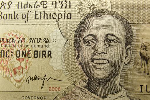 One Ethiopian birr banknote. Portrait of a young Ethiopian. Fragment of a banknote.