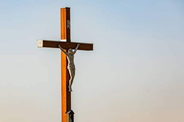 istock Yellow rape field with a cross, Poland 1410782770