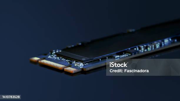 Ssd M2 Disk Close Up On Dark Background Stock Photo - Download Image Now - Spatholobus Suberectus Dunn, Hard Drive, Driving