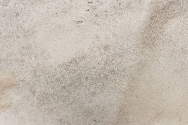 istock White beige paper background texture light rough textured spotted blank copy space background 1410785329
