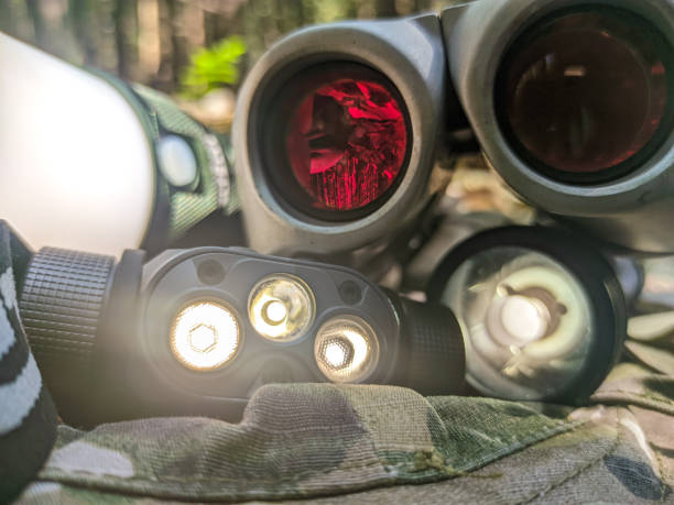 istock Headlamps and hand-held LED flashlights in the forest on a hike 1410785875