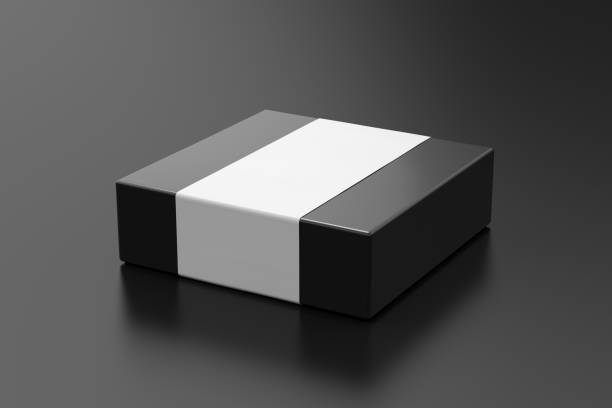 istock Square box mock up with blank paper cover label: Black gift box on black background. Side view. 1410786091