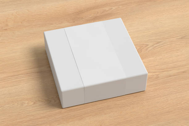 istock Square box mock up with blank paper cover label: White gift box on wooden background. Side view. 1410786152