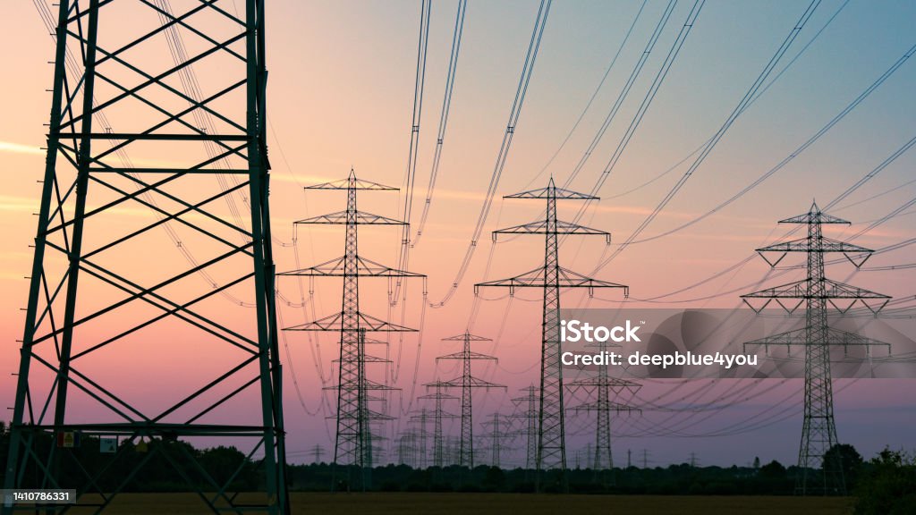 High voltage transmission tower Electricity Stock Photo