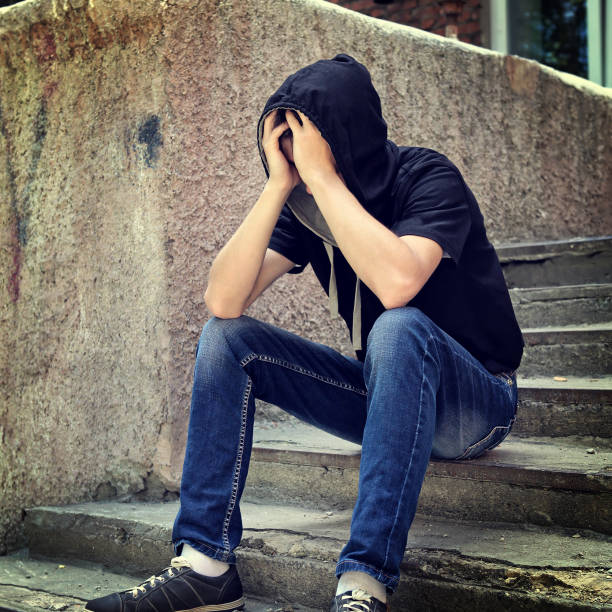 istock Sad Young Man outdoor 1410795341