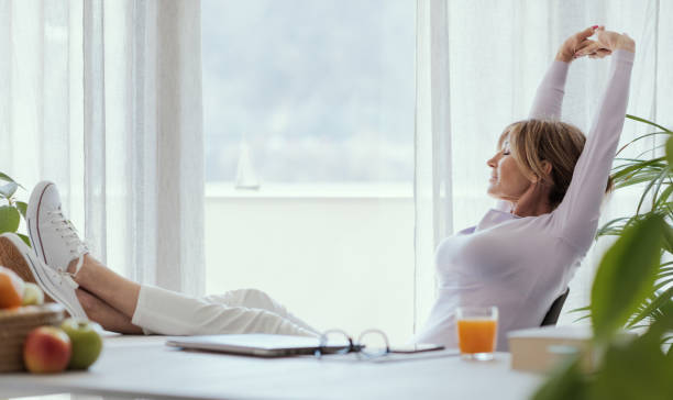 istock Mature woman relaxing at home 1410795542
