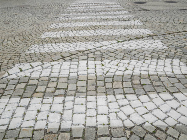 istock Pedestrian crossing on granite paving stones. 1410795745