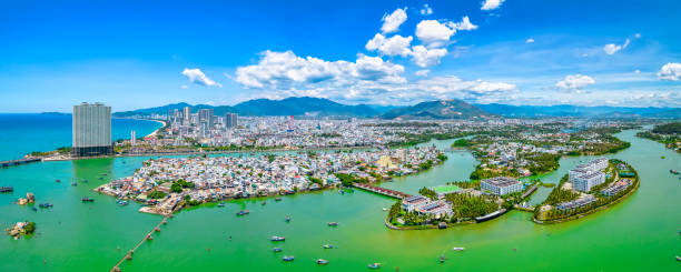 The coastal city of Nha Trang, Vietnam seen from above on a sunny summer afternoon stock photo