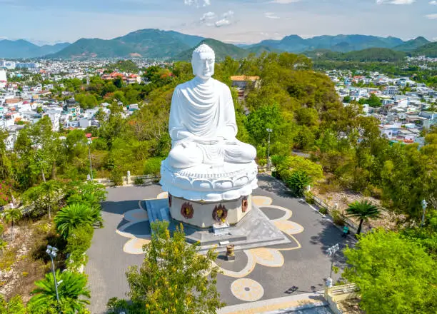 Aerial view big white Buddha in Long Son pagoda in Nha Trang, Vietnam in a summer day