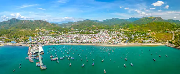 Vinh Luong fishing village, Nha Trang, Vietnam seen from above with hundreds of boats anchored to avoid storms, traffic and densely populated areas below