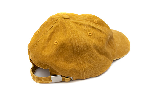 Mustard colored baseball cap, isolated on white background. For mockups.