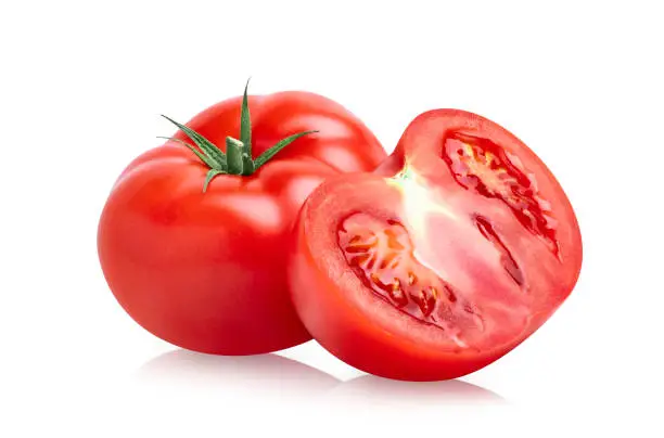 Tomato vegetables isolated on white background. Two fresh tomatoes whole and cut half. Clipping path.