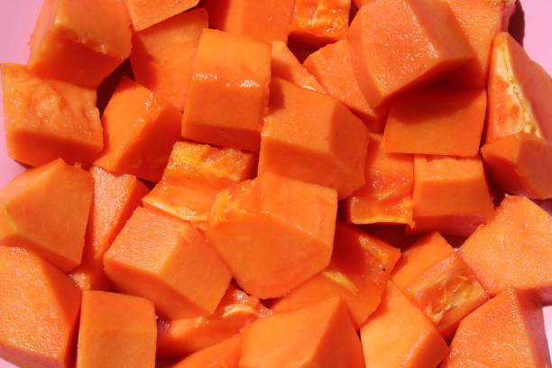 istock ripe papaya fruit that has been cut into small pieces 1410800531