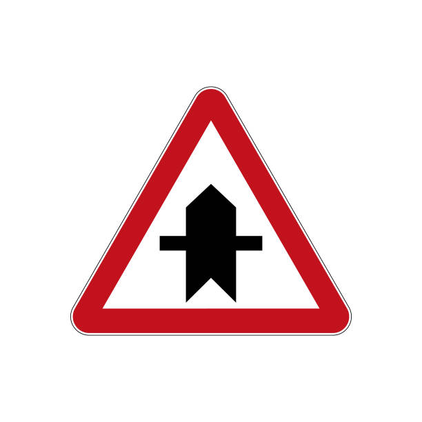 istock International road sign Minor road junction isolated on white background. 1410801766