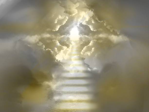 istock A mysterious cloud stairway leading to heaven and divine light shining from the sky shining through a gap in the sea of clouds. 1410804910