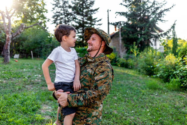 istock Soldier meeting his son. 1410805391