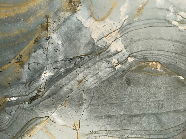 istock Gray slate stone surface background - stock photo 1410809937