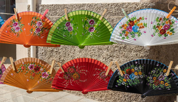 istock Fans of different colors with floral decorations 1410812745