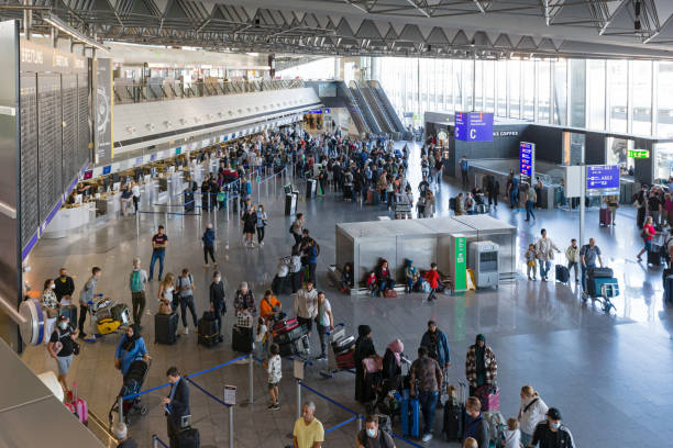 Passengers at the departure area of Frankfurt International Airport stock photo