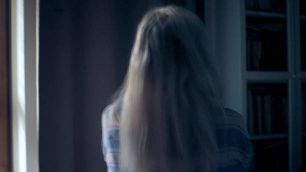 istock Tired woman getting up at night. Dealing with insomnia 1410815683