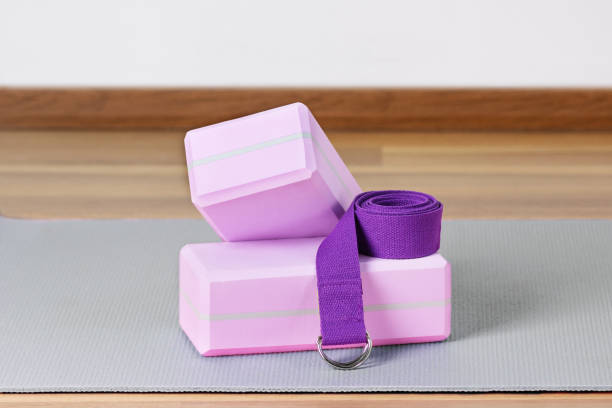 istock Yoga blocks, exercise mat and yoga belt for training. 1410816810